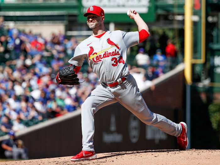 Sep 24, 2021; Chicago, Illinois, USA; St. Louis Cardinals starting pitcher J.A. Happ (34) delivers against the Chicago Cubs during the second inning of a Game 1 of the doubleheader at Wrigley Field.